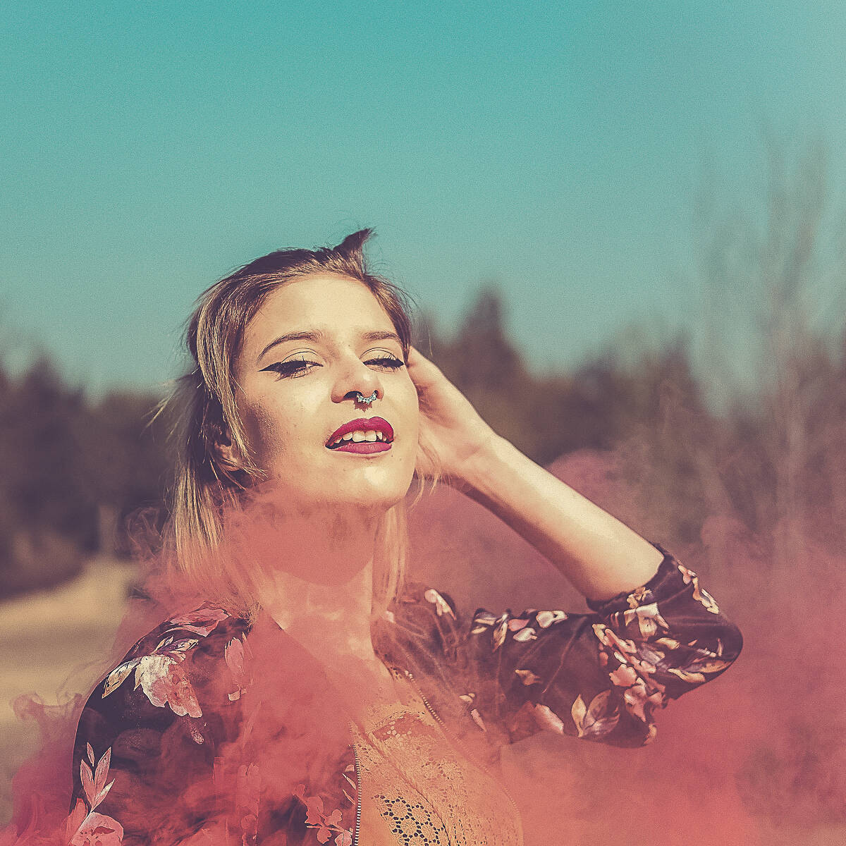 blonde woman with smoke